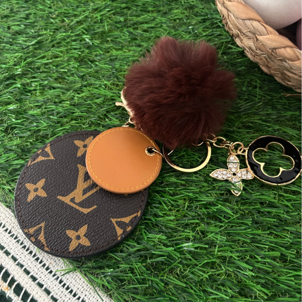 Monogram-Pattern Brown Pom-Pom Keychain - image 1